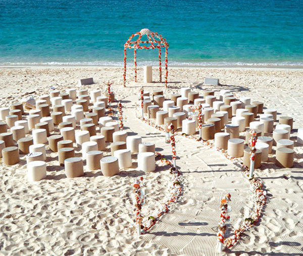 A gorgeous beach wedding ceremony. (via Colin Cowie Weddings)
