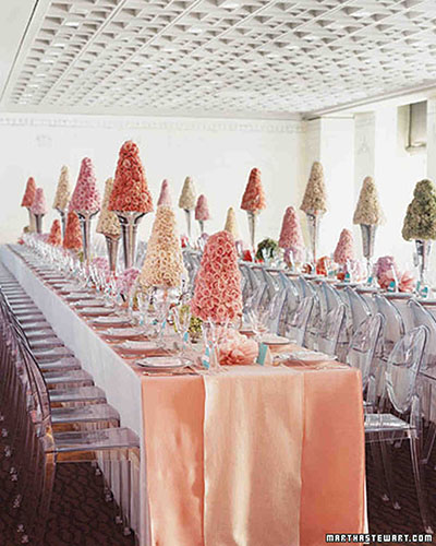 Rose topiaries on silver trumpet vases as holiday floral Christmas trees or centerpieces for winter weddings, from Martha Stewart Weddings