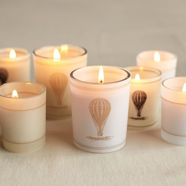 Vintage-style hot-air balloon wrapped votive holders.