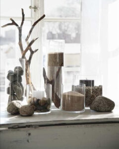 sand and stone in vase display