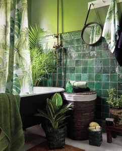bathroom with green walls awith green tiles and plants