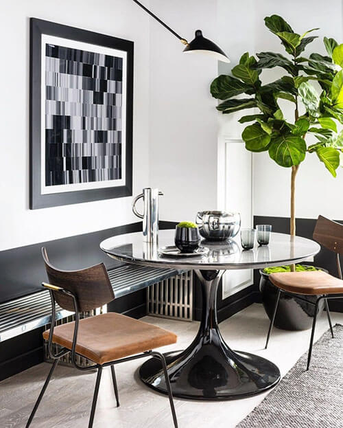 black and white breakfast dining nook decor with a fiddle leaf fig