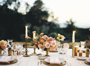 boho wedding reception table with cacti and candles
