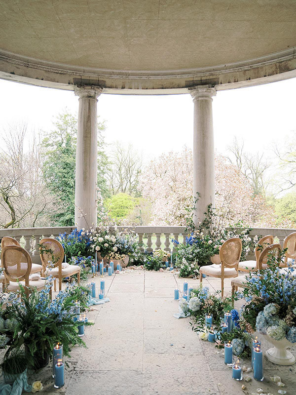 fairytale wedding ceremony with blue flowers