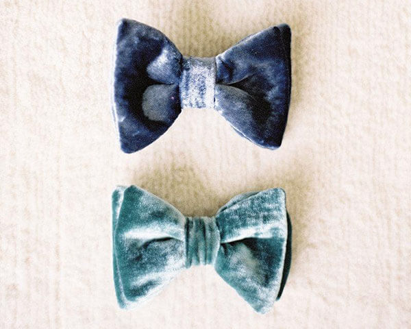 velvet bow ties in different shades of blue for groomsmen