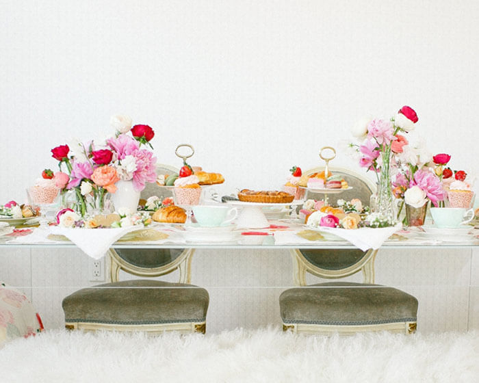 flower filled tablescape for tea party theme bridal shower